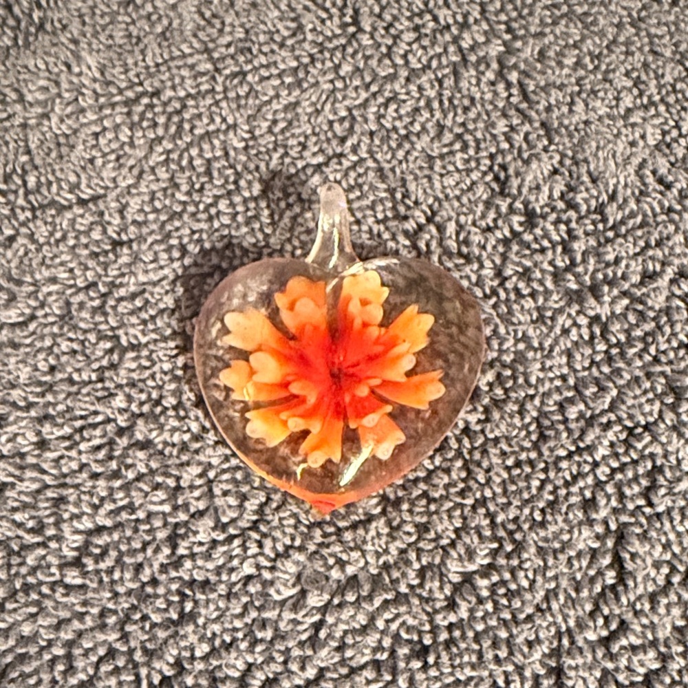 Heart-Shaped Glass Pendant with Orange Flower